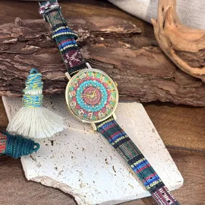 Bohemian ethnic style women's quartz watch with colorful woven canvas strap and mandala dial