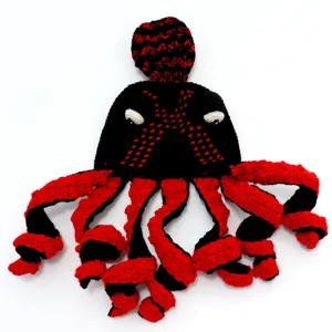 Handmade crochet octopus hat detail, funny black and red octopus headwear for Halloween party.