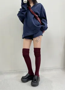 Solid color over-the-knee high tube socks for women, winter soft slouch socks, detail view.