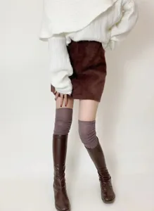 Cozy ribbed knit over-the-knee high socks for women, perfect winter long stockings.