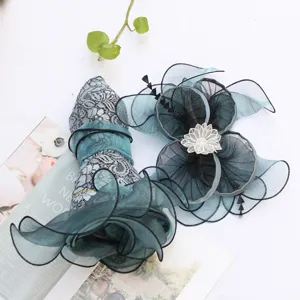 Organza lace sun hat for women, flat top beach travel hat with floral decor for vacation.