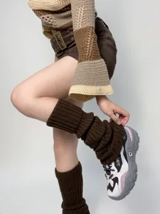 Brown knitted leg warmers for women, cozy slouchy thermal long socks for winter boots style.