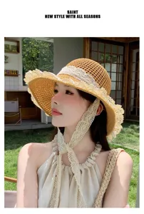 Woven straw sun hat for women with elegant lace trim and chin strap, perfect for summer beach.