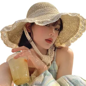 Woven straw sun hat with lace trim and chin strap for women summer beach vacation UV protection.