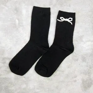 Black mid tube socks with white pearl bow, sweet style cotton socks, cute fashion hosiery.