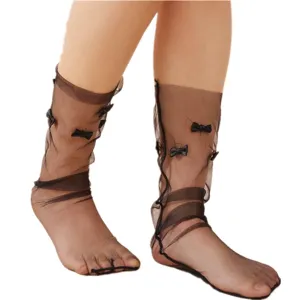 Detailed view of sheer black Lolita mesh socks with cute bow decorations for summer style.