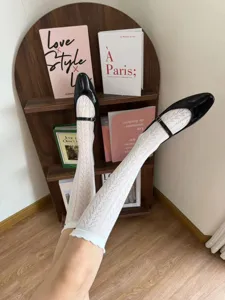 Breathable hollow mesh summer wheat ear socks with cute ruffles for sweet daily style.