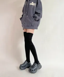 Black ribbed over the knee high socks for women, cozy and stylish long cotton knit socks.