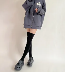 Comfortable solid color over-the-knee high socks for women, stylish autumn winter daily wear.