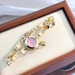 Hollow heart pendant bracelet quartz watch, exquisite small fashion women jewelry watch.