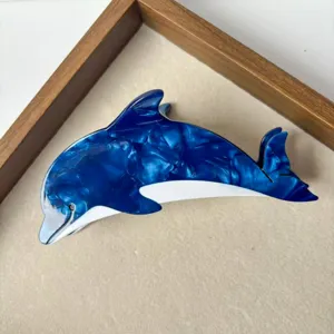Cute blue dolphin acetate hair claw clip for women and girls, stylish ocean style hair accessory.