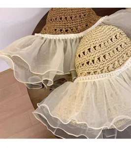 Straw sun hat with delicate lace mesh ruffles and pearls, wide brim summer beach hat.