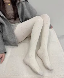 Collants ajoures a motifs de losanges pour femmes, leggings extensibles pour l'hiver.