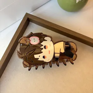 Detailed view of a cute anime character hair claw clip, brown resin hair accessory for daily wear.