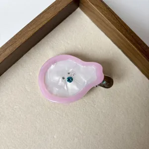 Simpatica molletta per capelli in acetato a forma di pera per bambini, cornice rosa e strass.