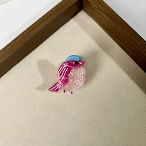 Cute acrylic bird hair claw clip for kids, sweet animal design hair accessories for girls.