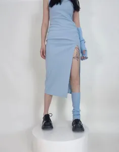 Light blue ribbed knit dress set with matching arm and leg warmers for a stylish autumn look.