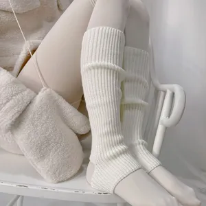 White knit stirrup leg warmers for women, cozy winter warm slouch socks, soft aesthetic hosiery.