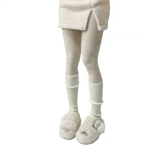 Cozy winter knit leg warmers and soft fuzzy slippers for women, cute cozy casual daily wear.