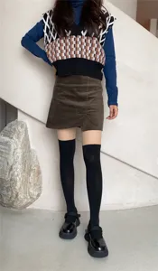 Sweet cool style knit vest corduroy skirt outfit details close up display clothing