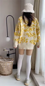 Women oversized jacquard knit sweater with white over-the-knee socks for a sweet cool look.