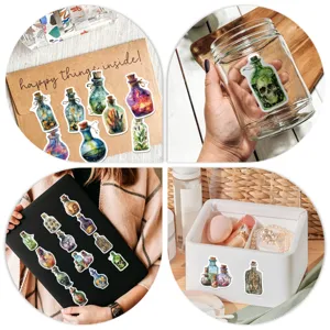 Closeup of waterproof witch potion bottle stickers showcasing vibrant watercolor fantasy designs.