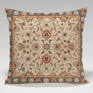 Close-up detail of the Persian cushion cover featuring intricate vintage floral patterns and rich borders.
