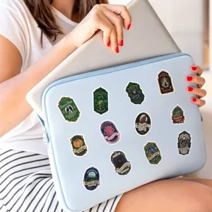 Detailed shot of vintage witch potion stickers applied on a cute laptop sleeve, waterproof.