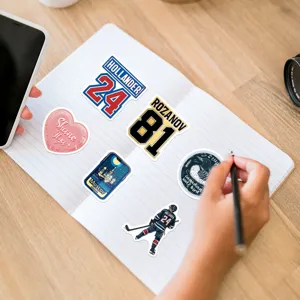 Waterproof hockey romance themed decorative graffiti stickers detail view on notebook.