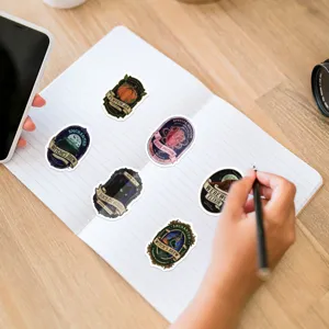 Detailed view of vintage witch potion stickers set on a notebook, waterproof vinyl decor.