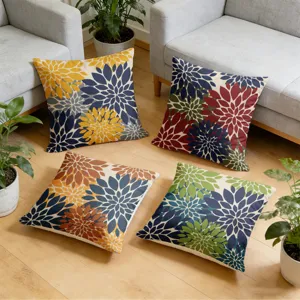 Dahlia floral throw pillow cover detail showcasing vibrant multi-color botanical print fabric.