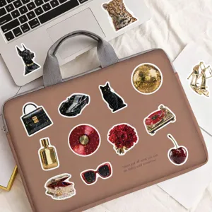 Detailed view of luxury red gold glitter stickers featuring chic fashion and retro designs.