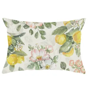 Detailed shot of watercolor lemon linen throw pillow cover, botanical floral print cushion.