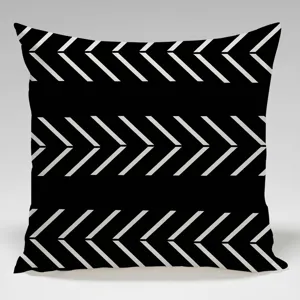 Black and white geometric throw pillow cover detail, modern chevron pattern for home sofa decor.