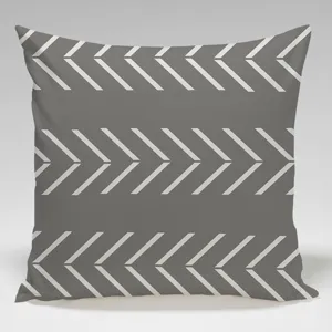 Detail view of the modern grey throw pillow cover featuring a clean white chevron geometric pattern.