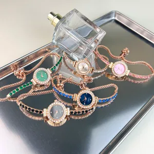 Orologio al quarzo con bracciale in strass di lusso da donna, vintage cinturino regolabile.