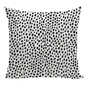Black and white spotted square throw pillow cover for modern sofa and bedroom home decor.