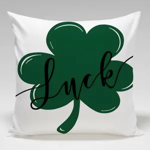 Detailed view of square pillowcase with green shamrock and Luck print for Nordic home decor