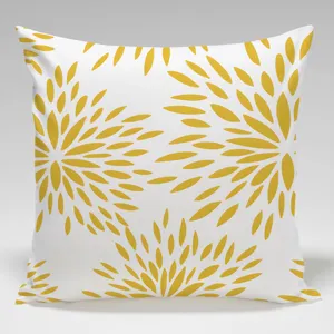 Vista di dettaglio della fodera per cuscino moderna e minimalista con motivo floreale giallo.
