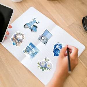 Detail view of blue coastal aesthetic stickers set, waterproof vinyl decal pack.