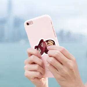 Decorative waterproof vinyl sticker featuring a cute macaron gift box design for phone cases.