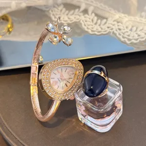 Women luxury quartz watch teardrop bangle bracelet with clover charm elegant wrist watch