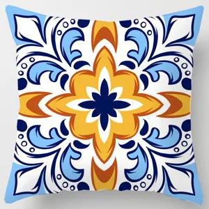 Detail view of decorative square throw pillow cover featuring geometric ethnic tile pattern.