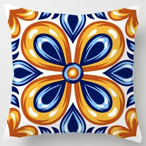 Detailed view of the geometric ethnic style pillow cover with vibrant blue and orange tile pattern.
