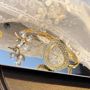 Elegant clover teardrop bangle quartz watch for women luxury style wrist accessory chic