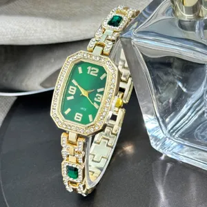 Fashionable women quartz watch with green dial, rhinestones and chic gemstone bracelet.