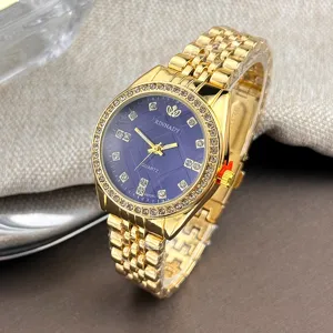 Elegante Damen Quarz Armbanduhr in Gold mit blauem Zifferblatt und funkelnden Strasssteinen