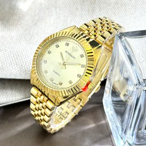 Elegante goldene Quarzuhr mit Zirkoniasteinen, klassischer Lünette und Metallarmband für Damen.