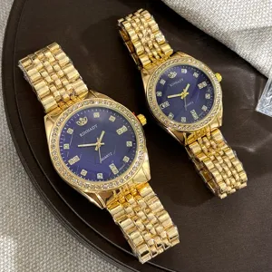 Luxus goldfarbene Quarz-Paar-Uhr-Set mit Strass und blauem Zifferblatt für Damen und Herren
