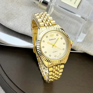 Klassische goldene Quarz Armbanduhr für Damen und Herren mit funkelnden Zirkoniasteinen.